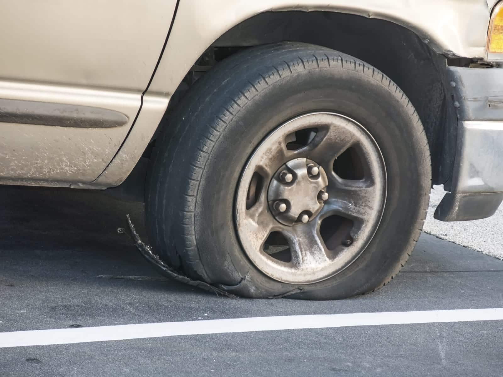 Pickup Truck With Flat Tire Stock Photo