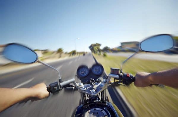 Man Riding His Motorcycle On A Sunny Day Stock Photo