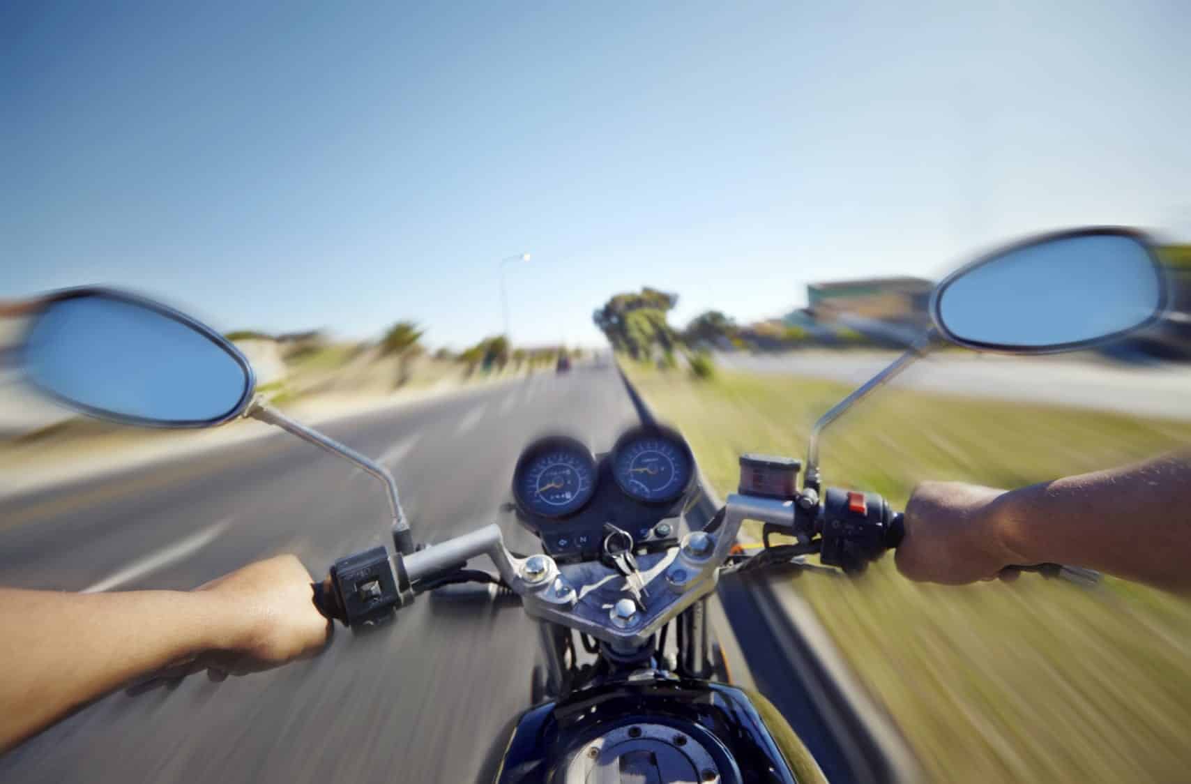 Man Riding His Motorcycle On A Sunny Day Stock Photo