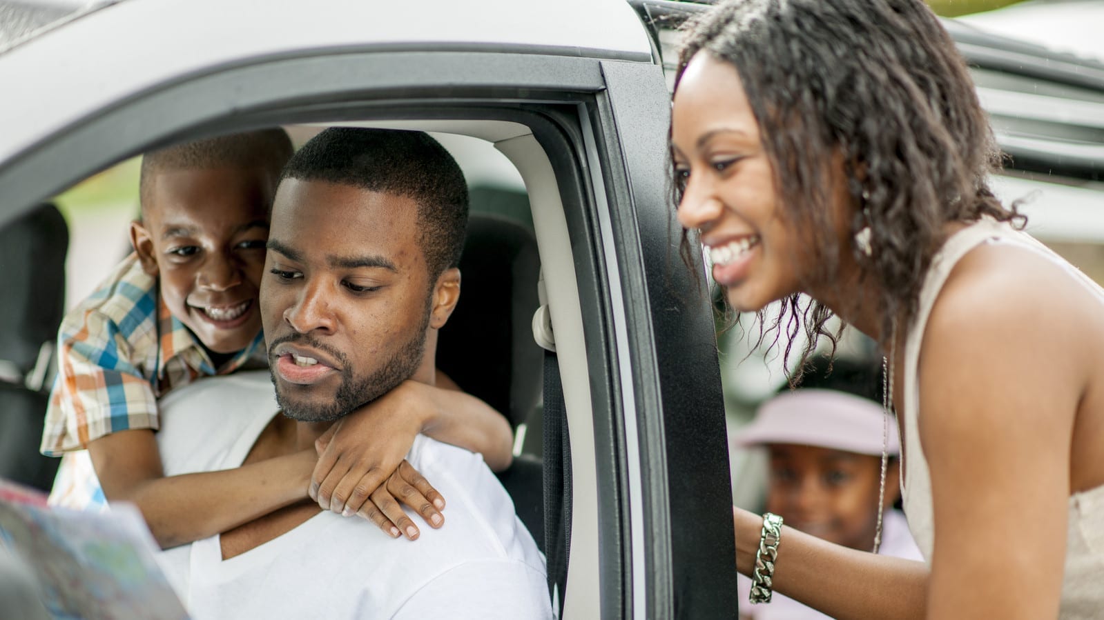 Family Preparing For Road Trip Stock Photo