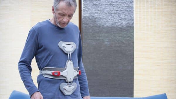 Elderly Man With A Spinal Cord Injury Stock Photo